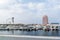 View of Abu Dhabi city famous Marina Mall, Marina eye wheel and Fairmont Marina Residences against cloudy sky