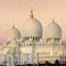View of Abu Dhabi Sheikh Zayed Mosque at sunset