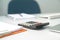 View of an Accountant`s office table, focus on calculator