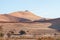 View accross Sossusvlei with Big Mamma dune and tourist visible