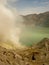 View on the acidic crater lake of the Ijen volcano in Indonesia, a sulfur mine and toxic gaz