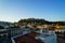 View of the Acropolis, Erechtheion, from Monasteraki Square through old town buildings, Tsisdarakis Mosque and Hadrian`s Library