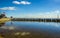 A view across the beach lagoon towards the longest pleasure pier in the world at Southend-on-Sea, UK