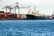 A view across Belfast harbor close to Queens Quay showing hugh containers