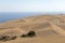 View across the desert landscape of Concon Dunes, a large area of sand dunes near Vina del Mar, Chile, South America