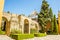 A view across the entrance courtyard of the Alcazar Palace in Seville, Spain