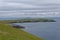 The view across the Eye Peninsula at Tiumpan Head to the small Fishing Village of Portnaguran on the Isle of Lewis