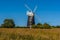 A view across a fallow field close to the village of Cley, Norfolk, UK