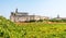 A view across the fields towards the abbey at Cala San Vito, Puglia, Italy