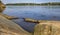 View across Lilla Vartan strait onto the shoreline of Stockholm suburbs, Lidingo island with traditional houses, Sweden