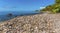 A view across a pebbled beach in St Kitts