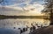 A view across Pitsford Reservoir, UK at sunset