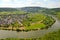 View across river Moselle to Puenderich village - Mosel wine region in Germany