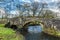 A view across River Syfynwy, Wales towards the Gelli bridge