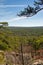 View across rock formations and pine treetops at Robbers Cave