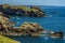 A view across the rocky coastline of Skomer Island breeding ground for Atlantic Puffins towards the mainland