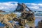 A view across the rocky shore of the impressive Bow Fiddle Rock at Portknockie, Scotland