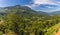 A view across tea country towards the distant Kothmale reservoir in Sri Lanka, Asia