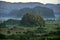 View across the Vinales Valley in Cuba. Morning twilight and fog.