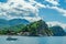 View of the Adriatic coast of Montenegro. Scenic panorama view of famous Bay of Kotor. Beautiful sunny day with blue sky and
