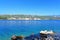 View of the Adriatic Sea and the Croatian city Rab with rocks in the foreground