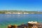 View of the Adriatic Sea and the island Rab, Croatia, with rocks in the foreground