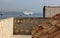 View of the Adriatic Sea over the stone townhouse terrace with red clay-tiled roof, Dubrovnik, Croatia