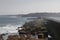 View from afar of the breakwaters in Port Socoa, France