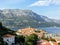 A view from afar looking down through the trees from a lookout of the beautiful ancient Croatian town of Korcula