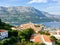 A view from afar looking down through the trees from a lookout of the beautiful ancient Croatian town of Korcula