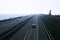 View on the Afsluitdijk in the Netherlands in blue tones