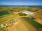 View of agricultural fields near ocean coastline in Australia.