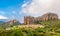 View at the Aguero village with Mallos de Aguero rock formations in Spain