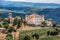 View Of Aiguines Village And Renaissance-style Chateau with mountains in Provence, France