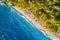 View from the air on the beach. Aerial view. Rest on the beach. Sea relaxation and travel. The forest near the sea.