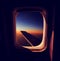 View from Airplane Window at Sunset