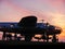 View on the airplanes on the Szeged Airport with the sunset in the background