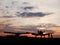 View on the airplanes on the Szeged Airport with the sunset in the background