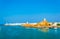 View of the Al Ayjah town, two watchtowers and a dhow under repair from the Khor Al Batah bridge in Sur, Oman...IMAGE