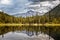 View of Alaskan Mountain Range reflecting in a lake