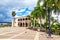 View of Alcazar de Colon Diego Columbus Residence from Spanish Square with blue sky. Famous colonial landmark in Dominican