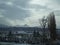 View of Almaty in the daytime in cloudy water. View of the mountains of the Zailiysky Alatau from the Gorny Giant microdistrict.