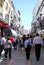 View along the busy Carrera Espinal shopping street, Ronda, Spain.