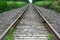 View along deserted railroad tracks