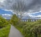 A view along the path beside the River Don leading to the Conisbrough Viaduct at Conisbrough, Yorkshire, UK