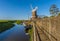 A view along the pathway beside the River Glaven on the outskirts of Cley, Norfolk, UK