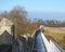 View along the pedestrian walkway on historic medieval city walls in york