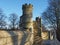 View along the pedestrian walkway on historic medieval city walls in york showing one of the small defensive towers found at