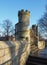 View along the pedestrian walkway on historic medieval city walls in york showing one of the small defensive towers found at