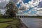 A view along the river Loughor at Pontarddulais towards the viaduct at Hendy, Wales